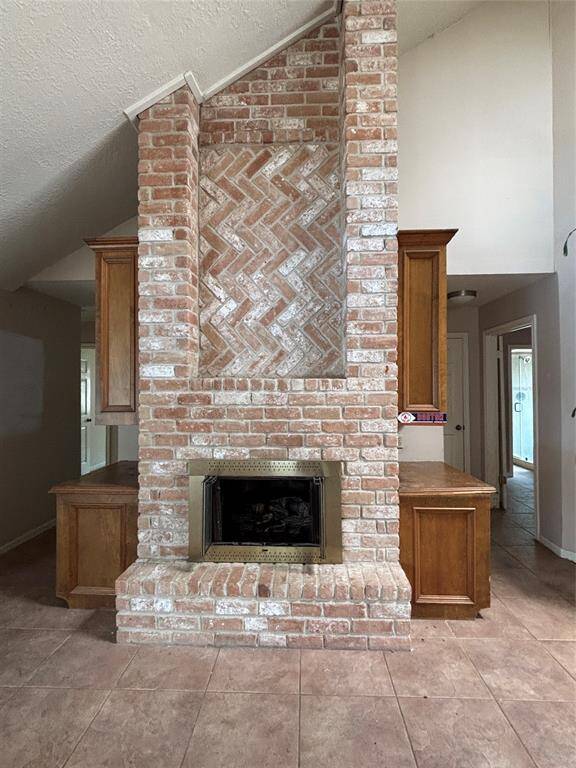 The brick at the fireplace is herringbone patterned and just stunning!