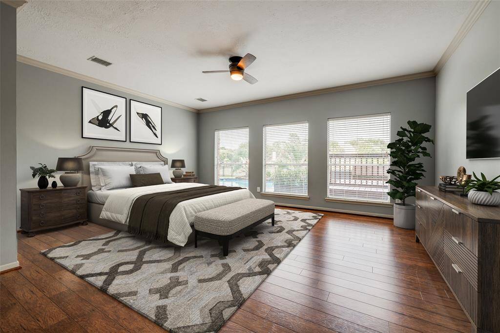 Oversized Primary bedroom with view of the pool and lake