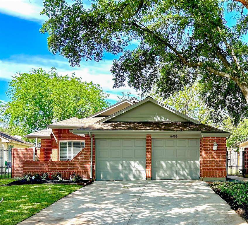 Charming single-story brick home in Copperfield with a two-car garage. Features a manicured front yard with mature trees providing shade. Ideal for a cozy suburban lifestyle.