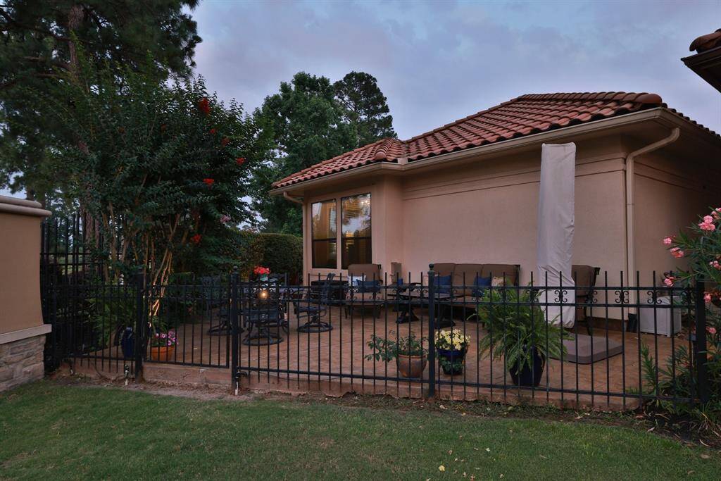 A morning view of the back patio looking out onto the pond.  There is a walking path that surrounds the pond and is a wonderful place to walk with friends or with just your ear pods!