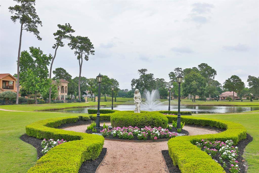 Enjoy tranquil strolls by the pond right from your back patio. This meticulously designed former builder's home ensures every detail delights.