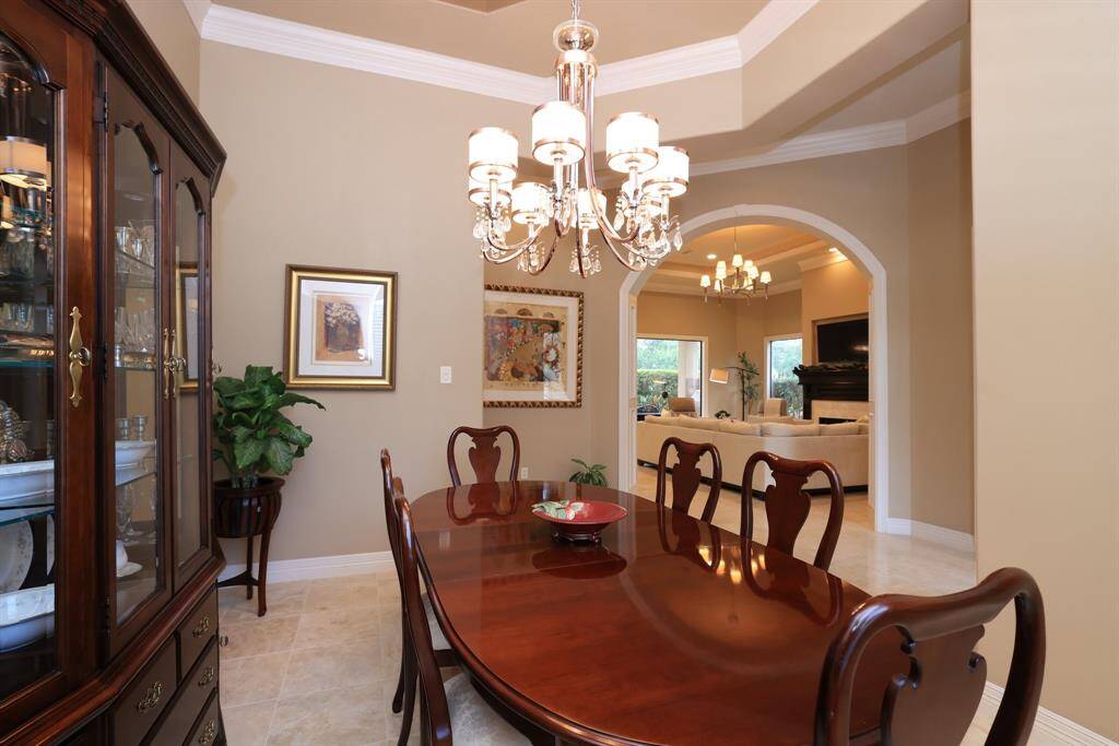 The architecture that is shown throughout the home is especially relevant in this beautiful space. You will notice the ceilings as you walk in - all with unique designs.