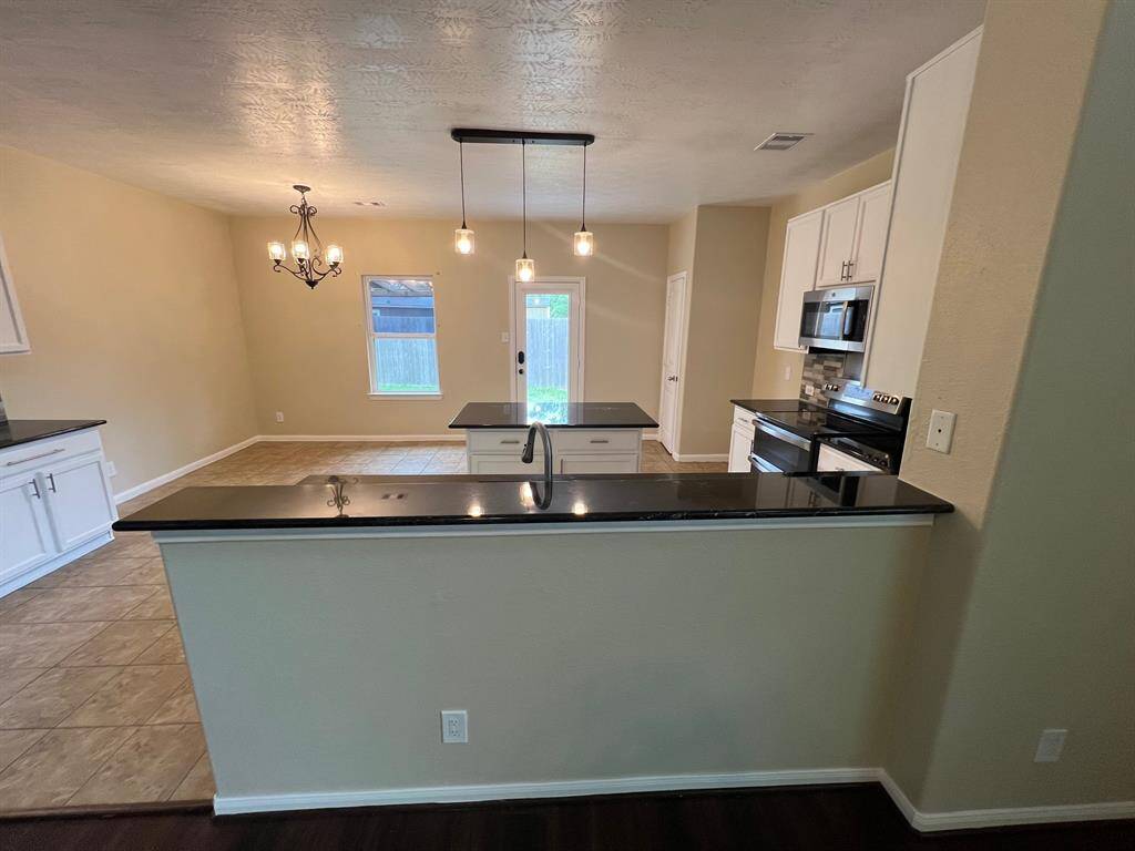 View into Kitchen from Living room