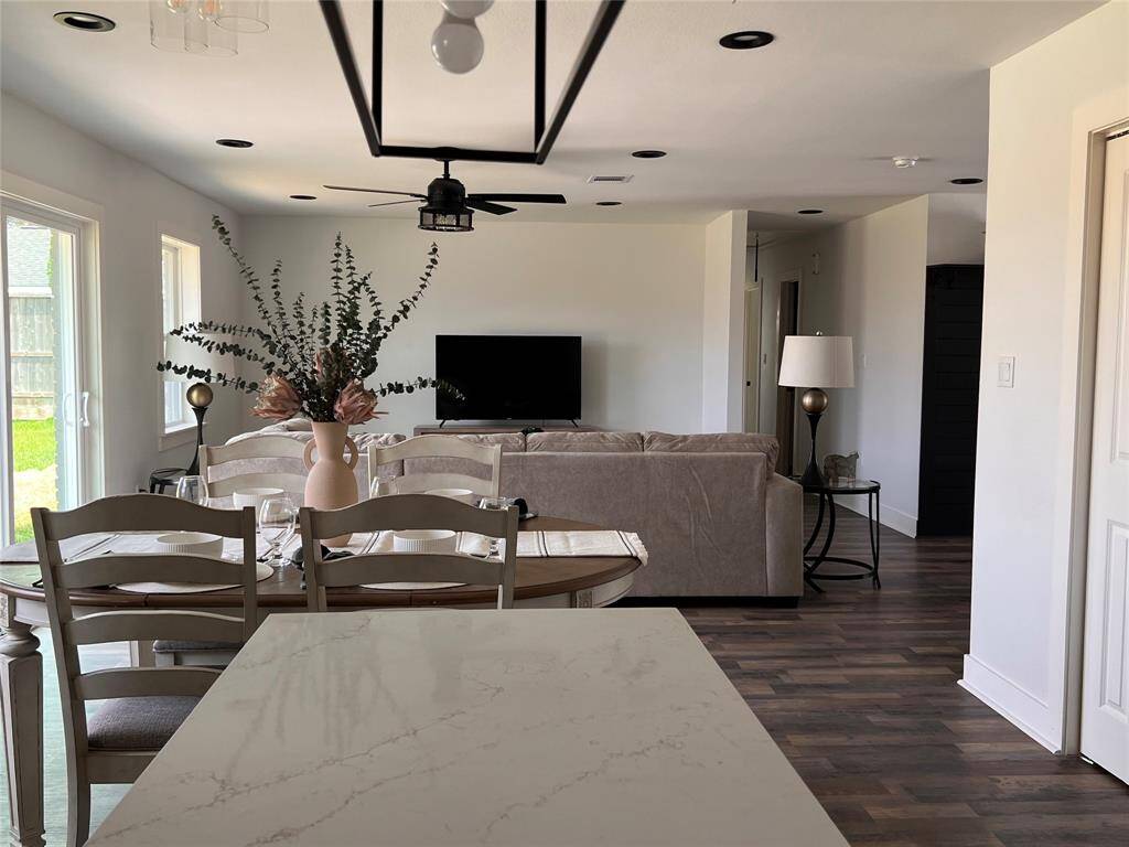 Dining and living looking from kitchen
