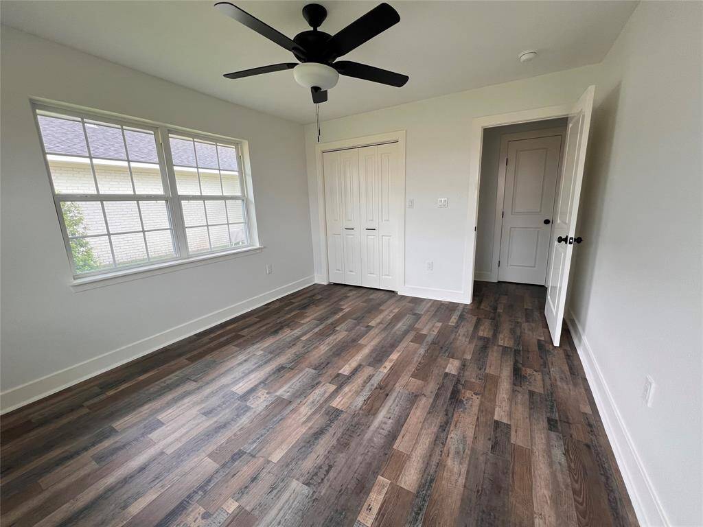 Bedroom 2 (also showing hallway closet for extra storage)