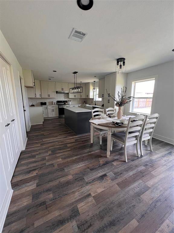 Dining open to kitchen