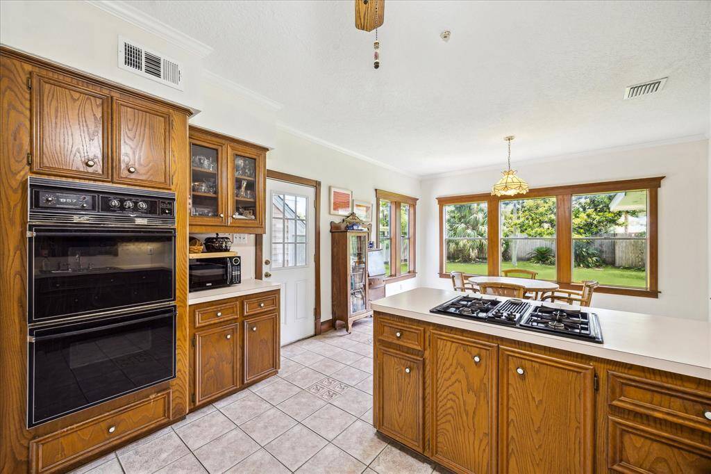 Amazing Kitchen offers ample cabinet space, a double oven, cooktop, fantastic storage options and open flow to the Breakfast Room.