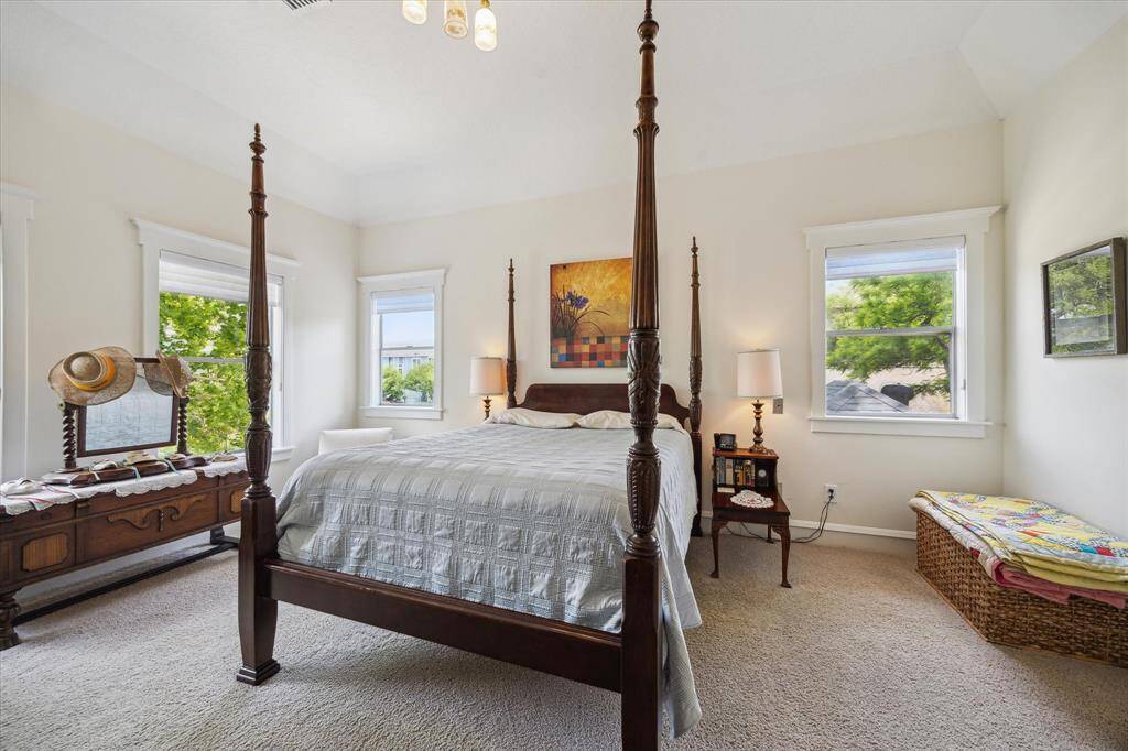 Another perspective of the spacious Primary Bedroom highlights its generous proportions and elegant features.
