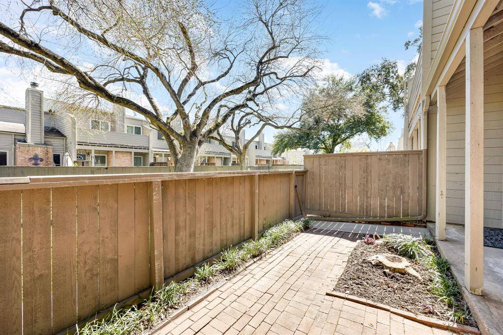 Enjoy both privacy and convenience with a gated entrance—perfect for letting in a gentle breeze while taking in the scenic neighborhood views.