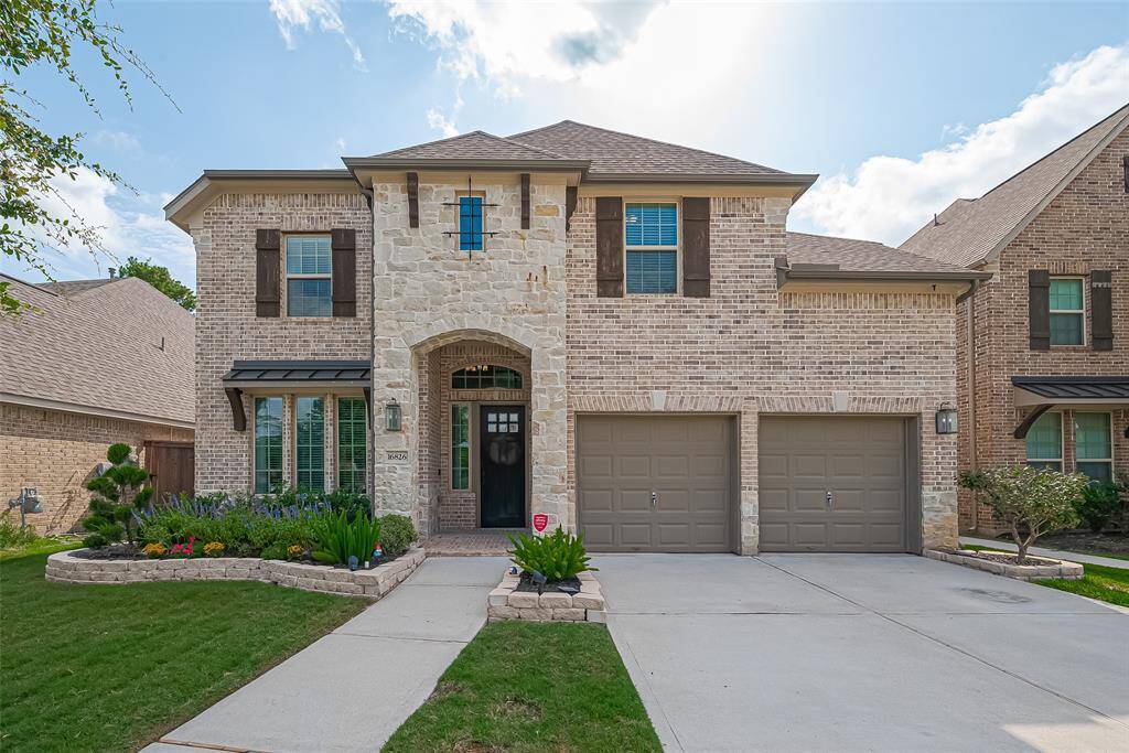 Welcome home! Beautiful brick and stone neutral colors