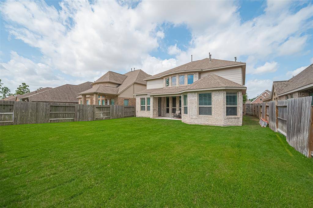 Texas size backyard ready for a spring fun day or a summer late night dinner