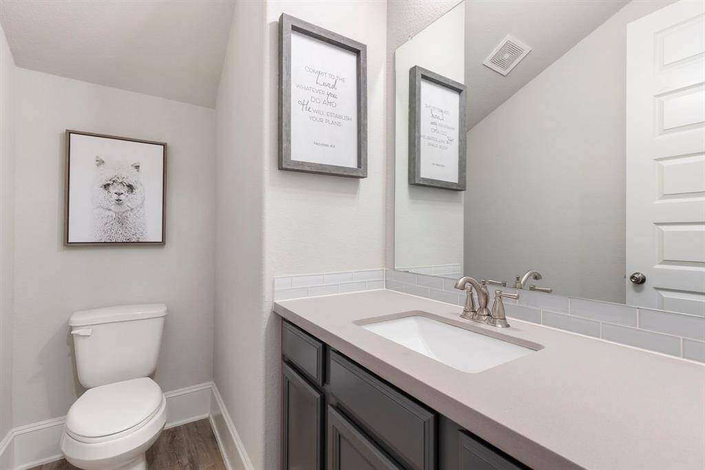 The half bathroom is spacious.