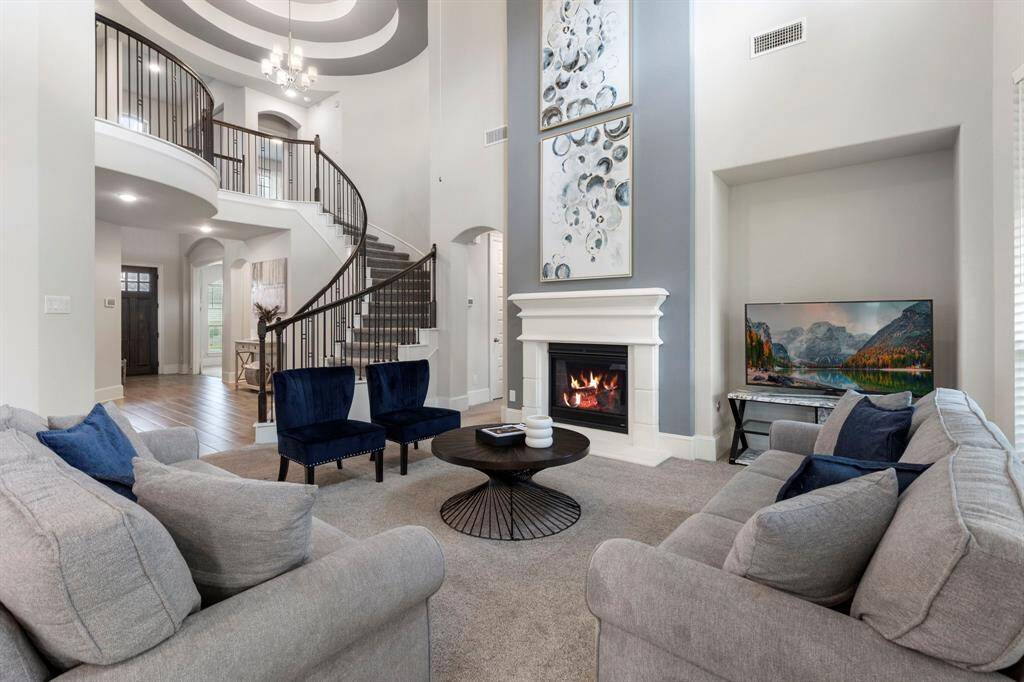 The picturesque view of the rotunda and spiral staircase from the Family room.