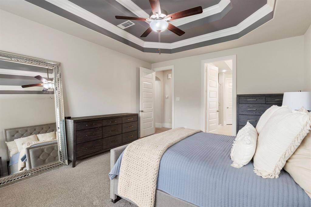 The Primary Bedroom is tucked in the back of the home.