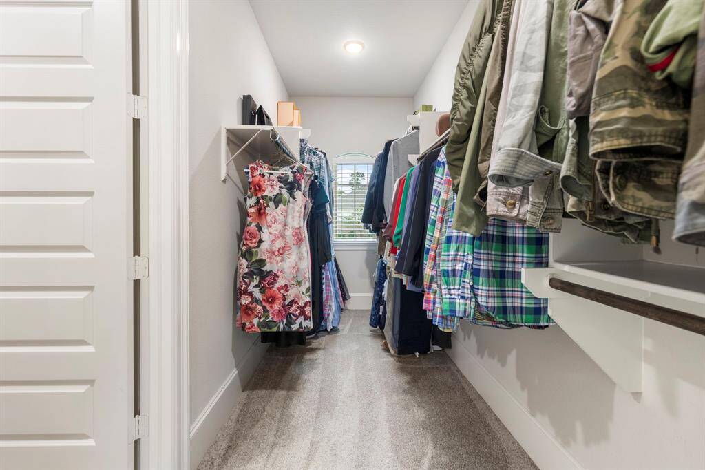The Primary closet has access directly to the utility room.