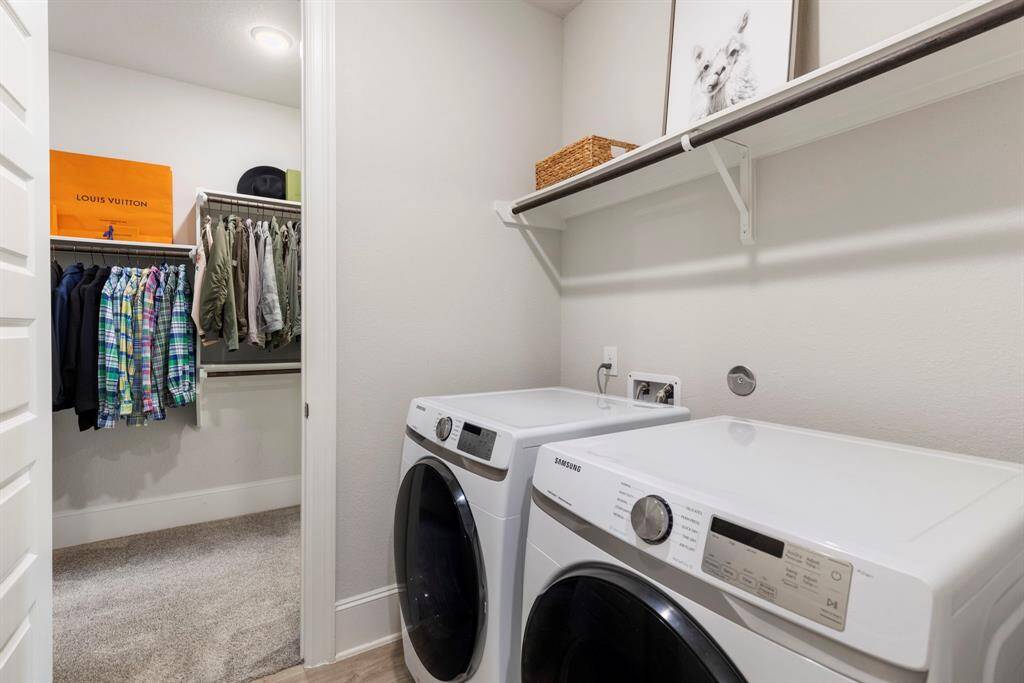The utility room is strategically located off the Primary closet and is closet to the spiral staircase for ease.