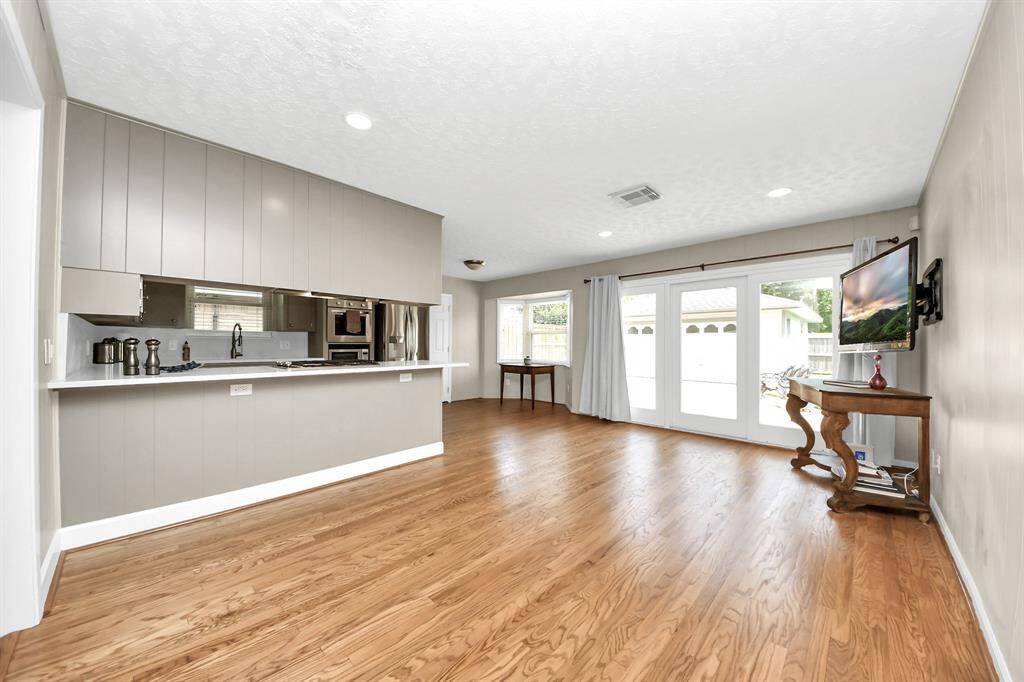 Seamlessly transition from the kitchen to the inviting family room.