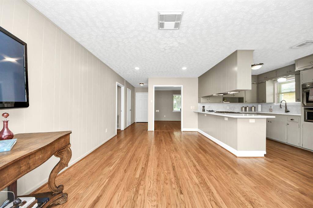 Seamlessly connect with family and guests in this open-concept kitchen and family room.
