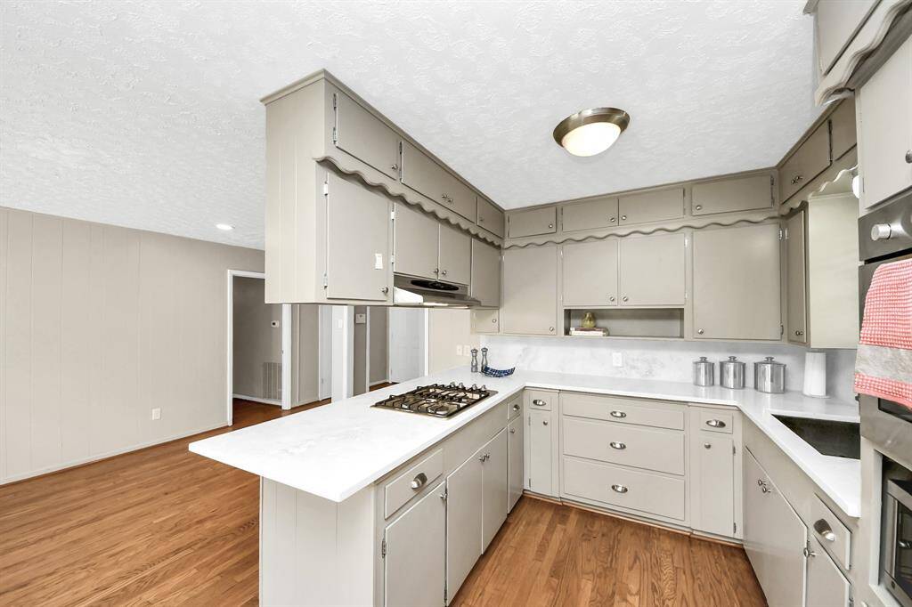 Elegant kitchen with an island perfect for seamless entertaining.