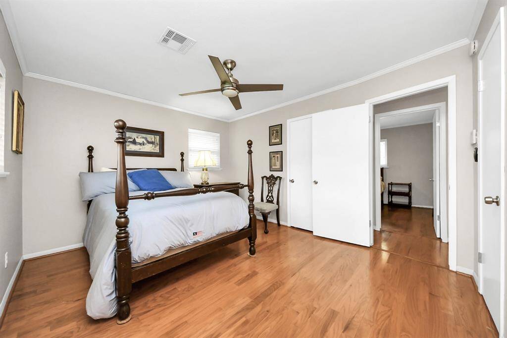 The master bedroom offers a cozy view of the hallway, enhancing connectivity within the home.
