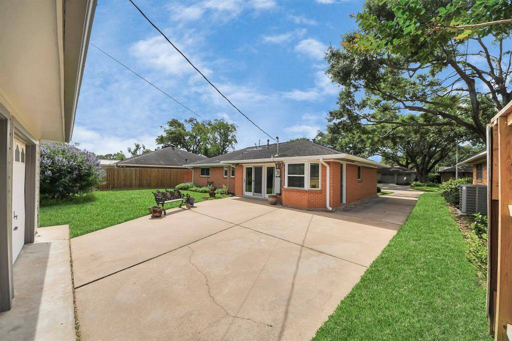 Spacious patio view from the garage, perfect for outdoor gatherings.