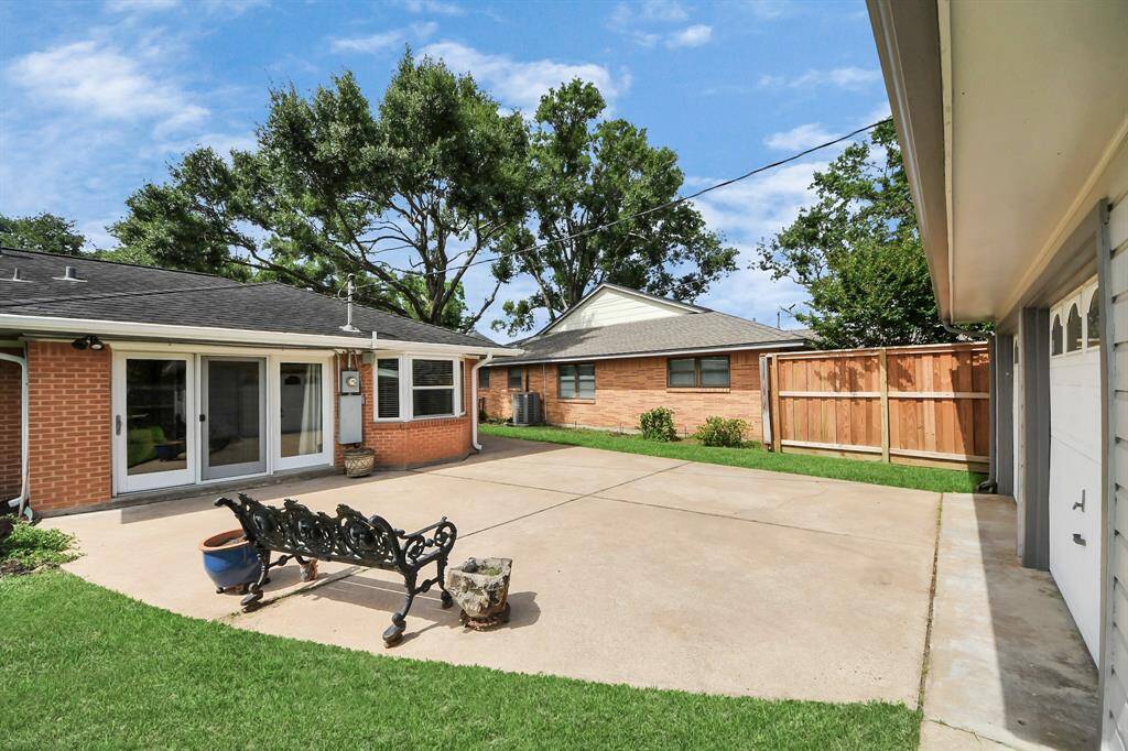 Enjoy seamless indoor-outdoor living with a patio view into the family room, accessible from the garage. Ideal for relaxation, even while doing laundry.