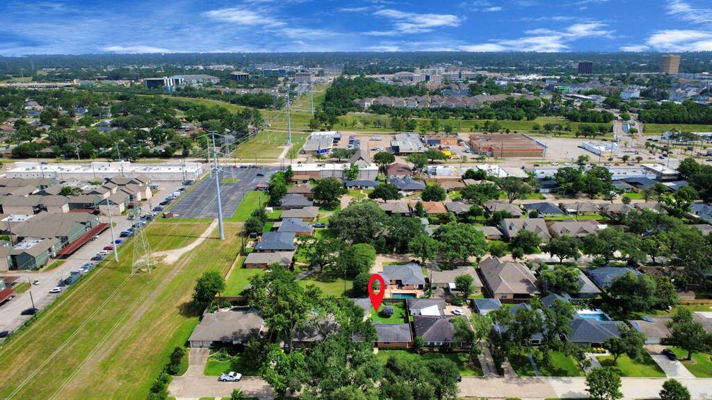 Stunning aerial view showcasing the property's prime location within a vibrant community.