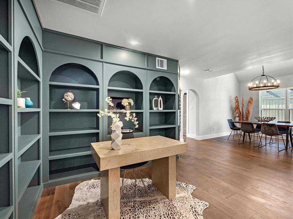 The floor-to-ceiling design in this space not only maximizes storage and functionality but also enhances the overall charm and character of this beautifully renovated home.