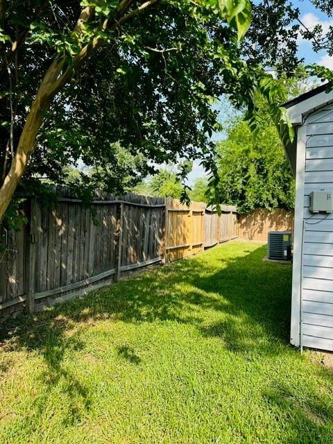 Covered Porch - Side yard off the Living Area via French doors.