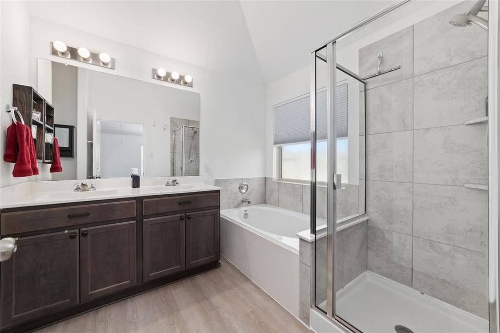 Primary bath with separate shower tub and two sinks