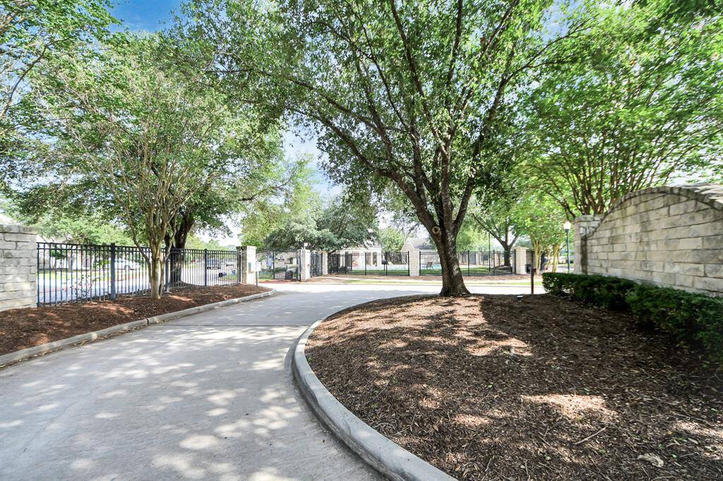 Secure, gated entry offers peace of mind in this private, beautifully maintained neighborhood.