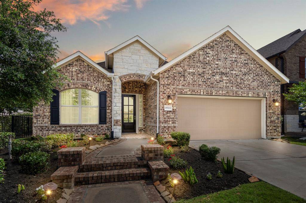 Welcome to 19723 Hale Hollow in Bridgeland. Immaculate and well-loved. Beautiful curb appeal welcomes you home.
