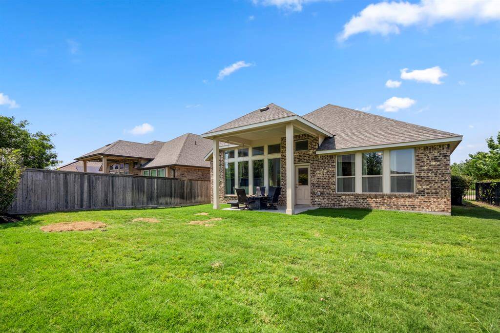 Yard is spacious enough for a pool on this corner lot.