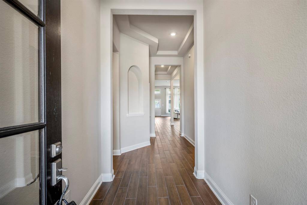 Just inside, tile floors greet you throughout the main spaces.