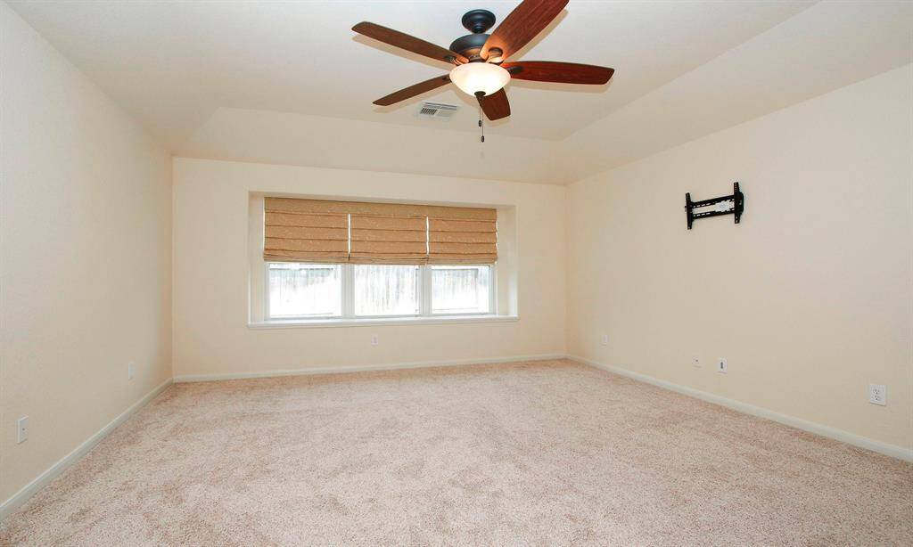 Custom triple blinds and TV mount will convey