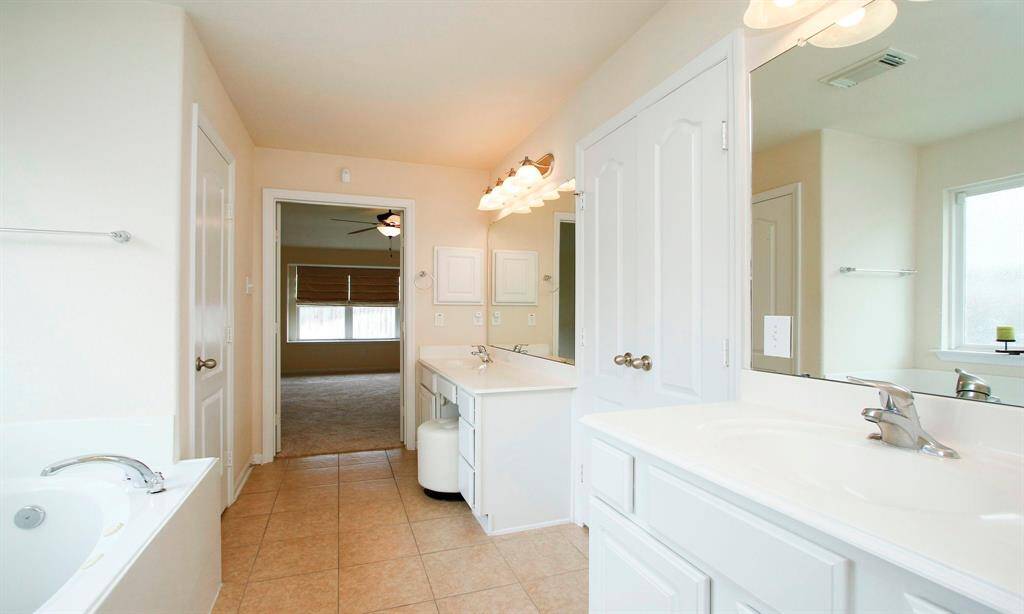 Tub is a jetted spa type. Private water closet