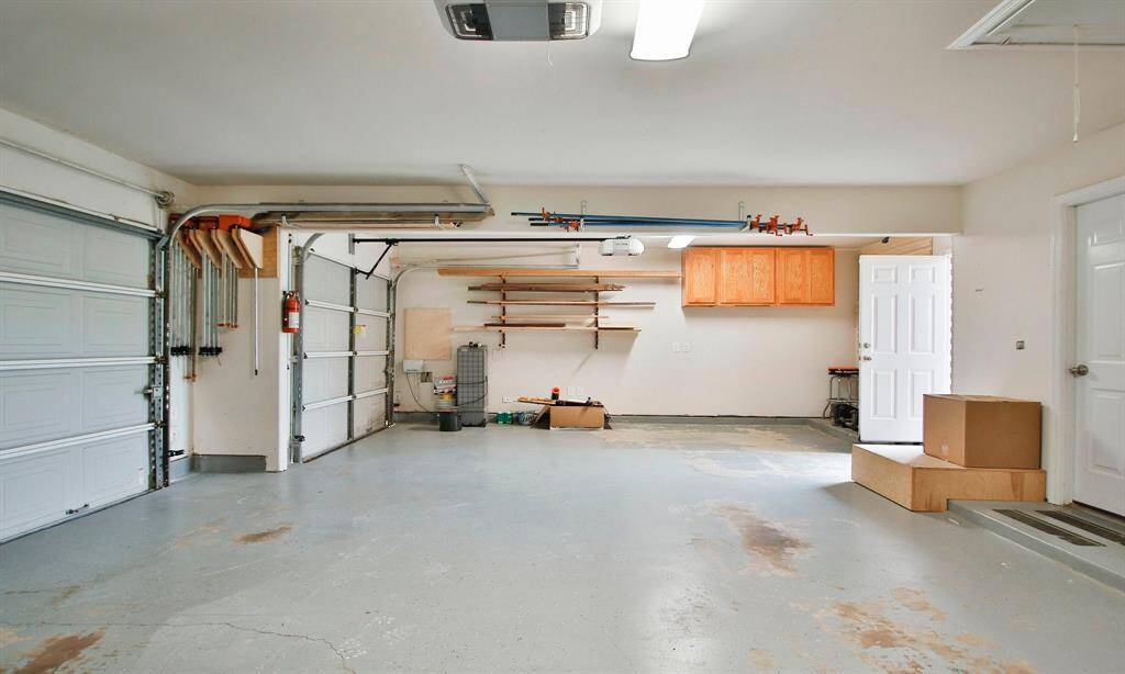 WOW, well look at this great storage PLUS a side door to the backyard. All built ins and cabinets will remain