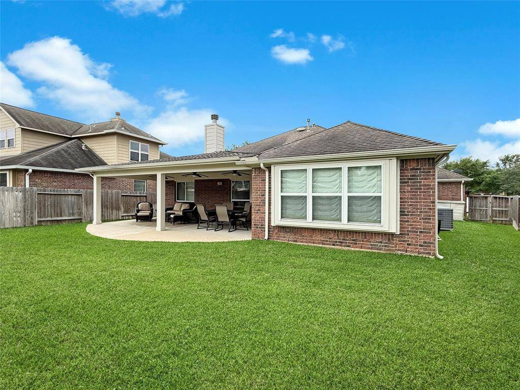Large side yard with gate.