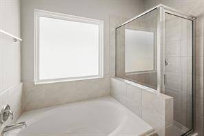 Primary bath with soaking tub and shower
