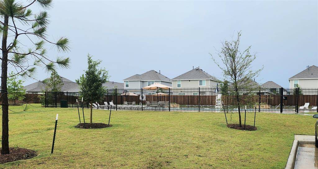 Pool area with covered area to the right.