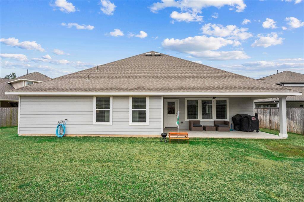 Large Covered Back Porch perfect for outdoor relaxing