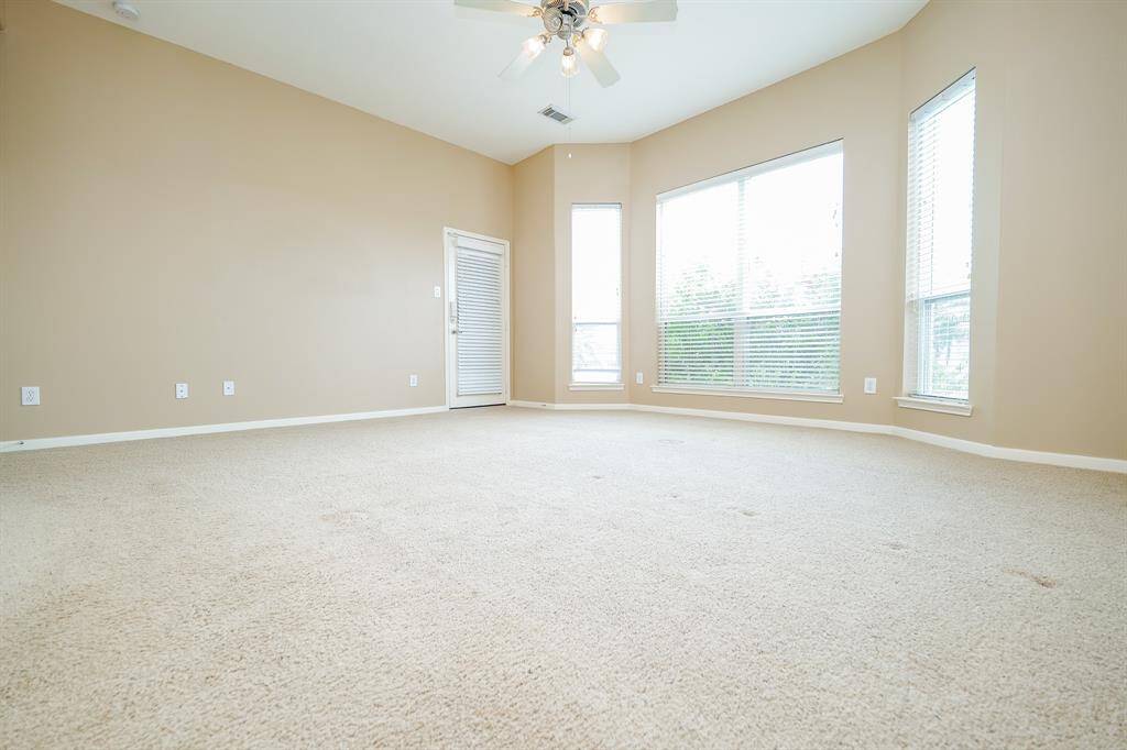 Welcome to your master retreat with enough space for a sitting area.