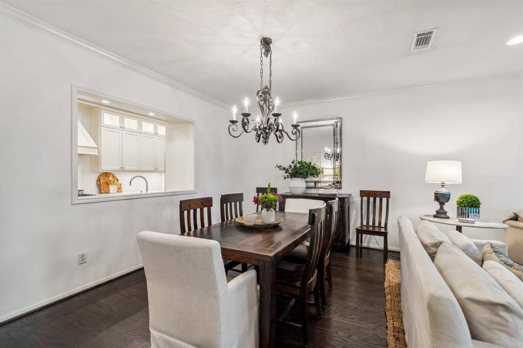 Dining room with a built-in pass-through window to the kitchen for easy serving.