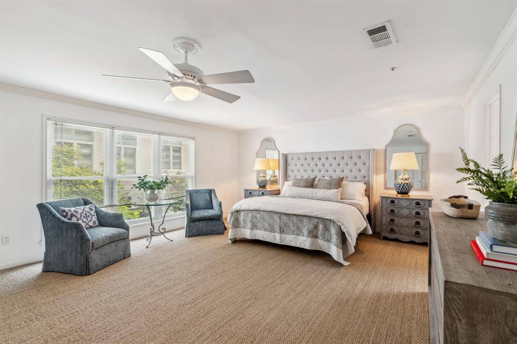 Upstairs, one of the two spacious bedrooms.