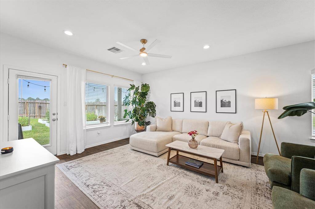 Large living area that is flooded with natural light.