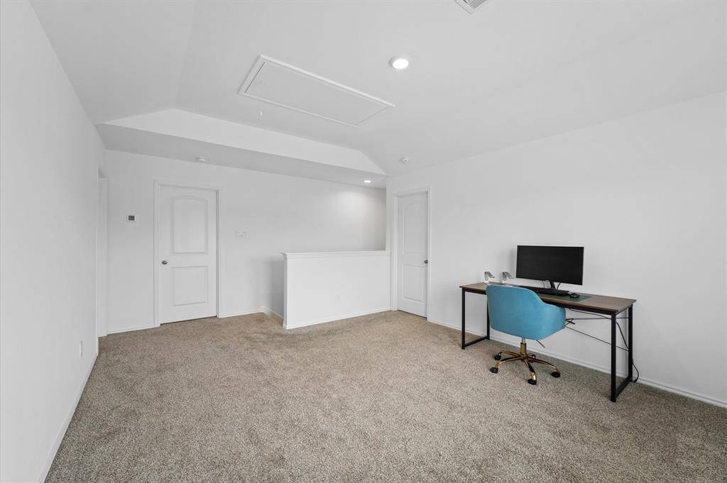 Large flex space/game room on the second floor. It can be used as second floor living, tv room, gaming room, or 4th bedroom - the options are endless.