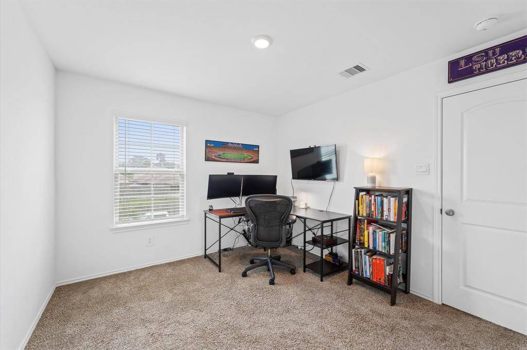 Second floor secondary bedroom currently being used as an office.