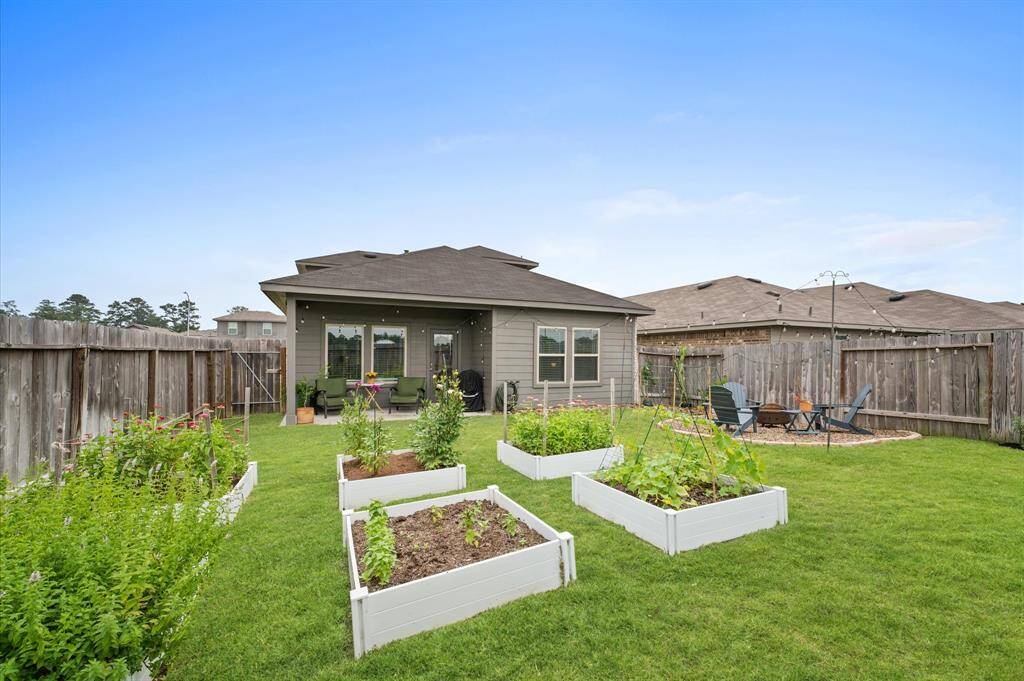 Stunning backyard is and oasis for birds, bees and butterflies.