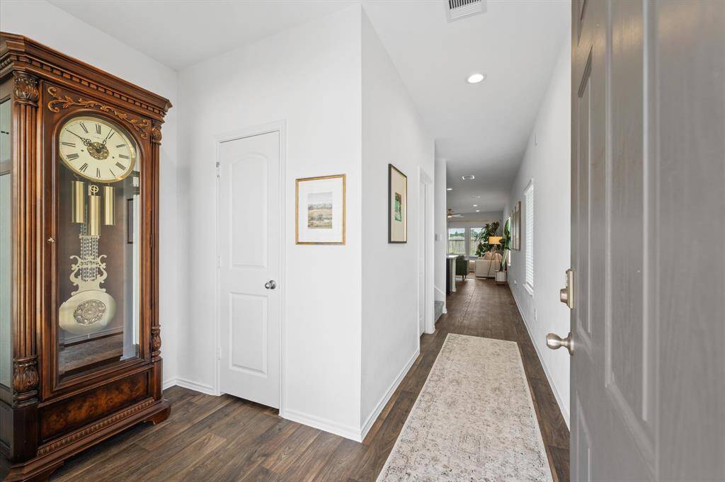 Entry has a conveniently placed closet for seasonal jackets.