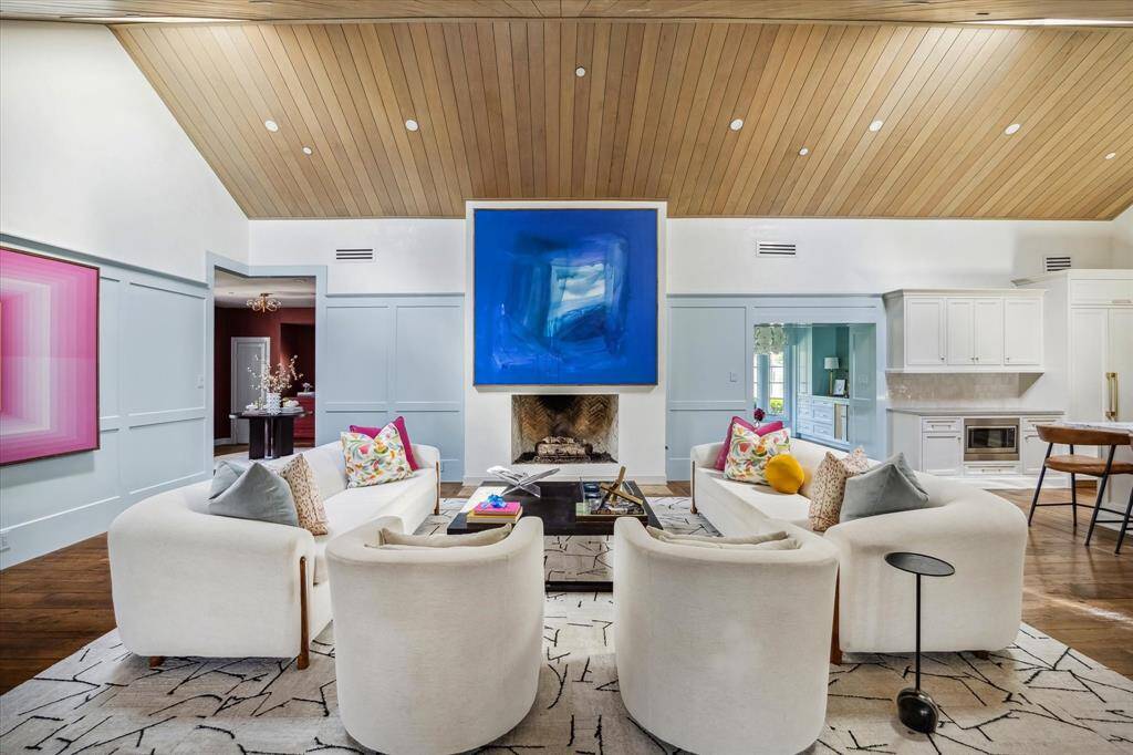 Additional view of the formal living room.